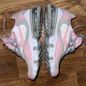 Size 4Y Pink, White, and Grey Nike Reacts